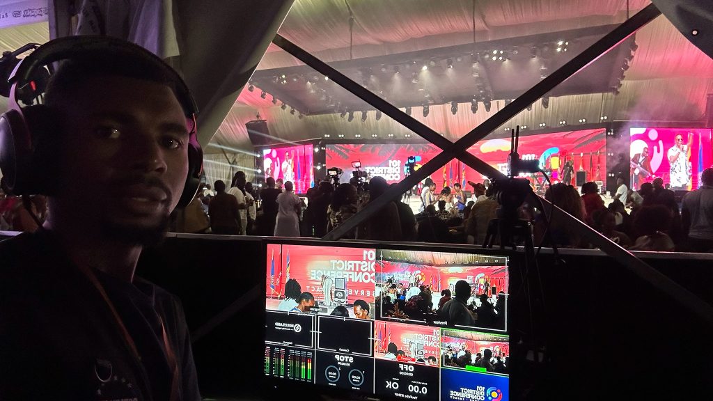 Jotek operator running a multi-camera livestream at a conference banquet